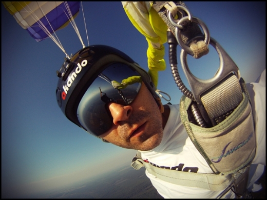 Skydiver wearing helmet and Akando Xtra Vision Dark Goggles